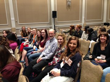 Students from the Honors Program seated in a row.