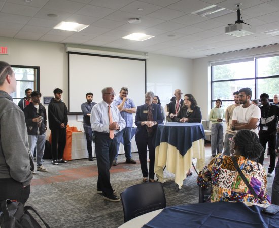 President Todd Pfannestiel and Provost Stephanie Nesbitt welcome incoming International students to Utica University.